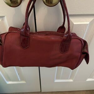 Dark red bag has no brand name